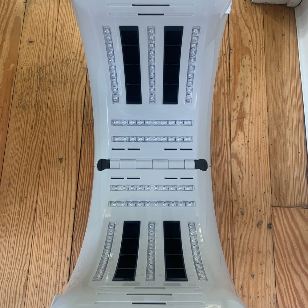 Glamour New York. Foldable seven colour light rejuvenation apparatus.